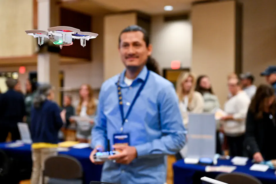 Professor flying a drone