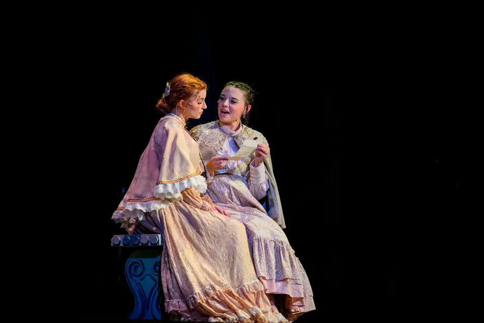 Students acting on stage